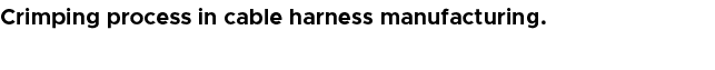 Crimping process in cable harness manufacturing.