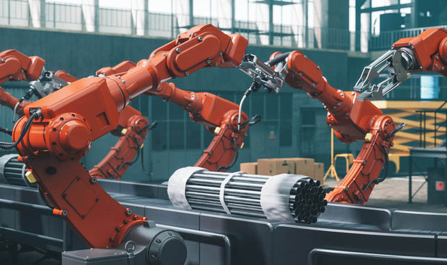 Industrial robots at the automated manufacturing factory assembly line.