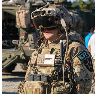 Sgt. 1st Class Kyle Williams, platoon leader for 3rd Platoon, Blackhorse Company, 2-3 Infantry Regiment, 1-2 Stryker Brigade Combat Team wears upgraded Integrated Visual Augmentation System goggles while being interviewed by an Army public affairs reporter before a movement-to-contact urban raid exercise on Joint Base Lewis-McChord, Wash., August 24, 2022. The exercise was part of a two-day demonstration event hosted by the Program Executive Office of Ground Combat Systems with the aim of integrating soldier feedback into the development of new military combat technology. (U.S. Army photo by Spc. Chandler Coats, 5th Mobile Public Affairs Detachment)