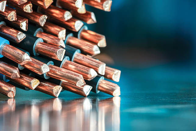 Metallic industrial space with a pile of copper cables