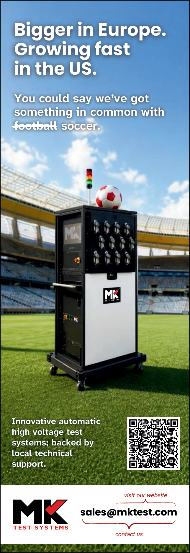 A white machine with a red ball on top. Description generated by AI
