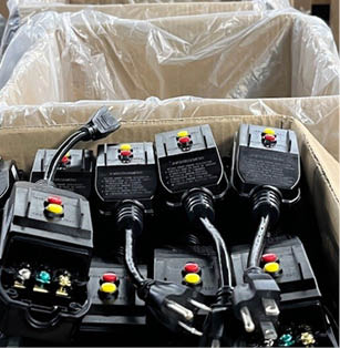 A box of electronic devices is displayed, including a power supply and a motor. AI generated content
