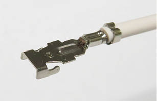 A white wire with a small black object attached to it. AI generated content