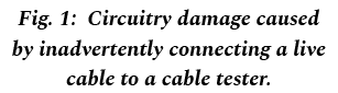 Fig. 1: Circuitry damage caused by inadvertently connecting a live cable to a cable tester.