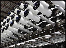 A large machine is producing white fabric. AI generated content