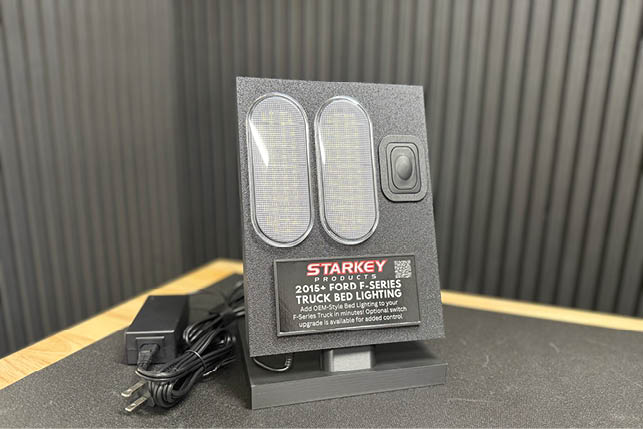 A black box with a Starky logo on it. Description generated by AI