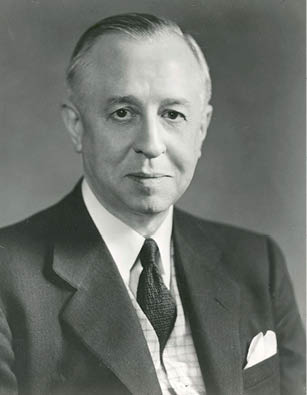 A man wearing a suit and tie. Description generated by AI