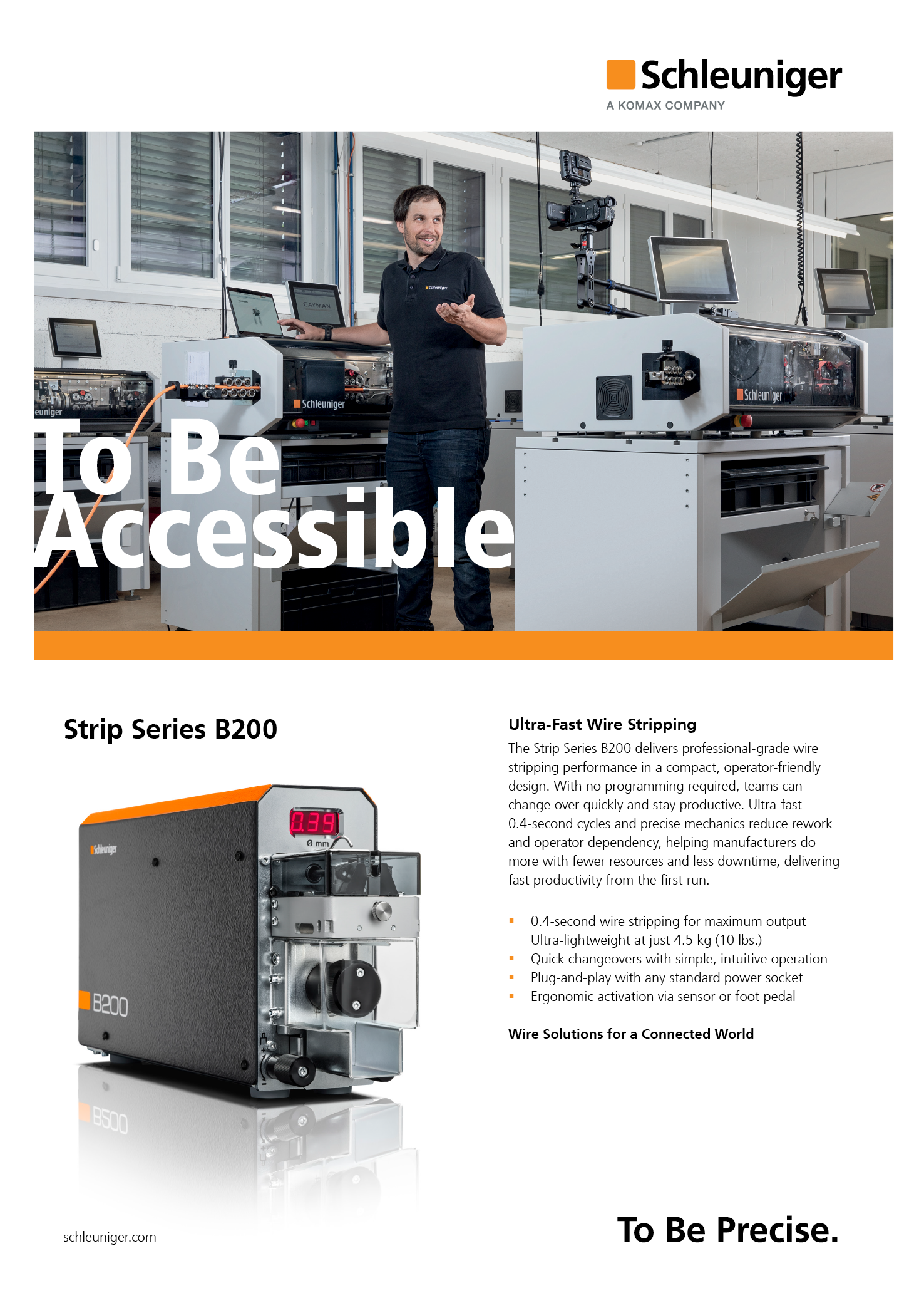A man standing in front of a machine. Description generated by AI